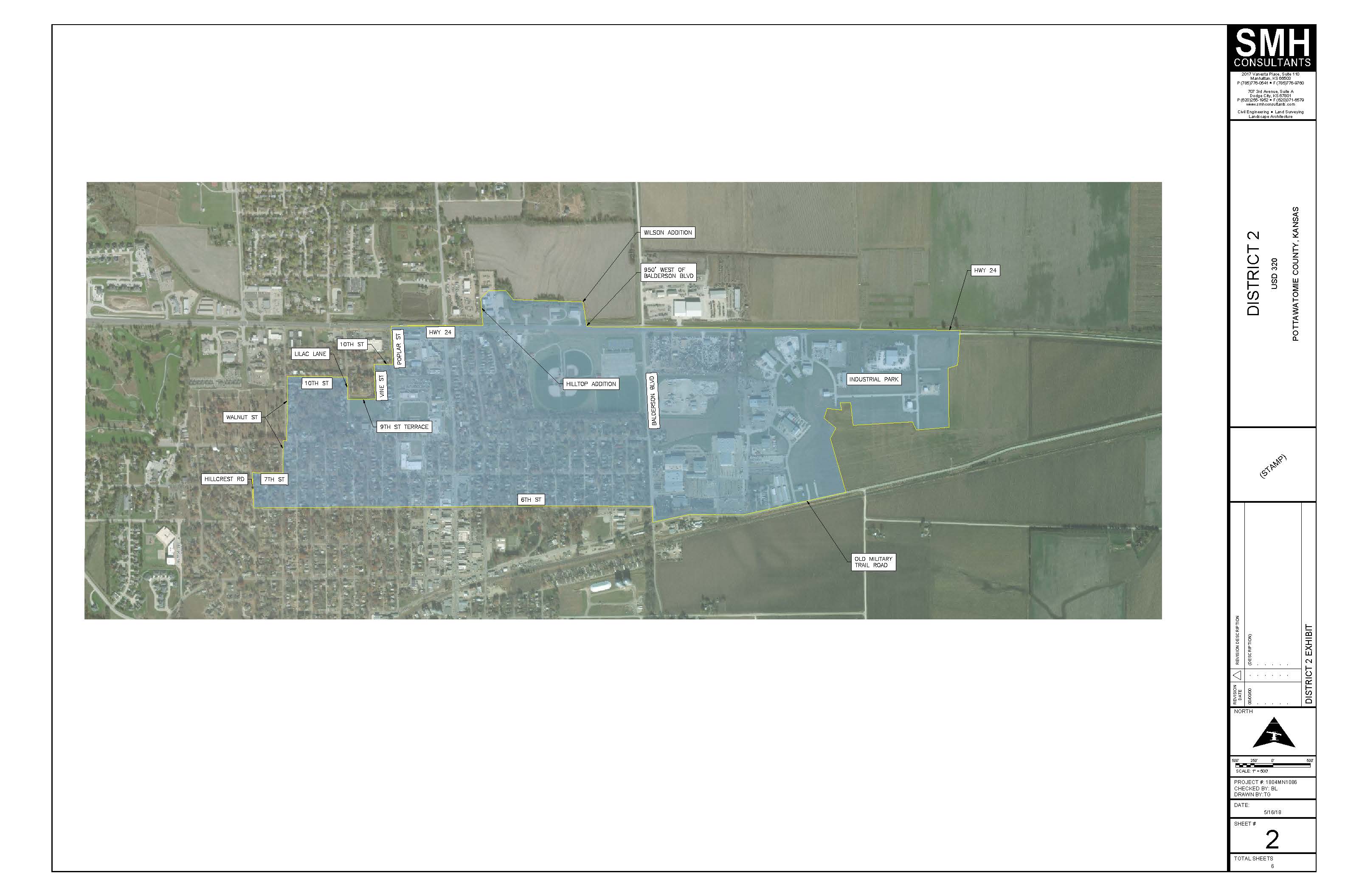 Aerial map of District 2, shaded in blue with a yellow outline. The area includes much of eastern Wamego and the industrial park. Major roads labeled include 8th St, HWY 24, Balderson Blvd, Wilson Addition, Industrial Park, and Old Military Trail Road. Residential areas such as Hilltop Addition, 10th St Terrace, Walnut St, and Wildrose Rd are marked. Title block on the right identifies this as part of USD 320undefineds boundary exhibits.